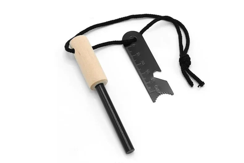 Create sparks to start a fire with ferro rod and striker. flint and steel. ruler and bottle opener