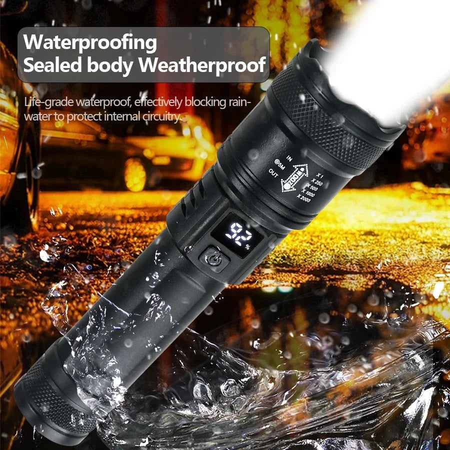 Ultra bright flashlight with telescopic zoom feature, battery, and charging cable.